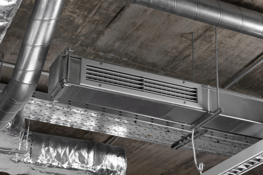 Close-up of commercial ventilation system during professional air duct cleaning in St Louis MO